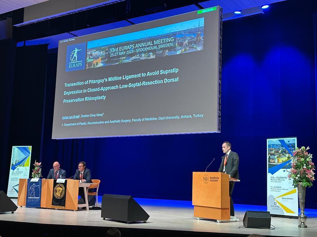 Dr. Ayhan Işık Erdal presenting closed-approach low-septal-resection dorsal preservation rhinoplasty research at the 33rd EURAPS Annual Meeting in Stockholm, Sweden, May 2023